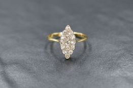 An 18ct gold diamond set navette ring, set with old cut diamonds, marked 18ct, ring size M, 1.9g