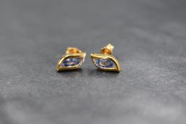 An 18ct sapphire and diamond set pendant, the illusion set diamond above four multi-cut sapphires in