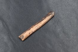 A yellow metal presumed gold bar, acid tests as high carat, 4.7g