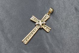 A 9ct gold diamond set cross pendant, marked 375, 4cm L, 2.3g