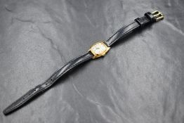 An 18ct gold Audemars Piguet wristwatch, the champagne dial having Roman numerals in an 18ct gold