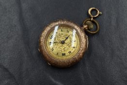 A 9ct gold open face top wound pocket watch, the golden dial having Roman numerals with scroll