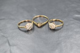 A group of three 9ct gold diamond set rings, comprising an illusion set diamond chip solitaire, a