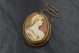 A yellow metal presumed gold cameo set brooch, depicting the greek goddess Selene, the goddess of