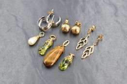 Three pairs of 9ct gold earrings for pierced ears, all of different forms, approx 3.5g, and four