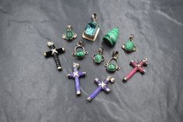 A selection of white metal polished stone pendants, most stamped 925, including six malachite and