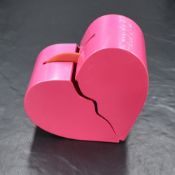 A Swatch Time For Love wristwatch, the yellow, red and blue dial in a clear case, on a strap