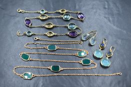 Two gold plated chains stamped 925 having bezel mounted multi coloured non precious gem stones at