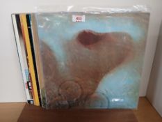A twenty record lot with classic rock , pop , prog and more as in photos - viewing recommended -