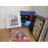 A twenty record lot with classic rock , pop , prog and more as in photos - viewing recommended -