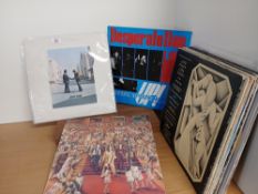 A twenty record lot with classic rock , pop , prog and more as in photos - viewing recommended -