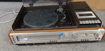 A Sony Stereo Music System HMK-77 with cassette player and dust cover