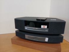 A Bose CD / Radio wave music system with multi CD changer - and remote