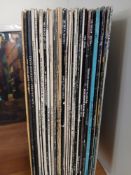 A thirty record lot with rock and pop as interest as in the photos - VG/VG in general with viewing