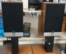 A pair of Wharfedale 506 speakers on stands