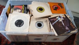 A large box of seven inch singles which appear to be an ex DJ/Roadshow collection - viewing