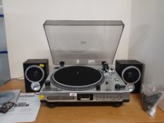 A Turntable / CD recorder in excellent condition - barely used - made by Zennox - come with 2