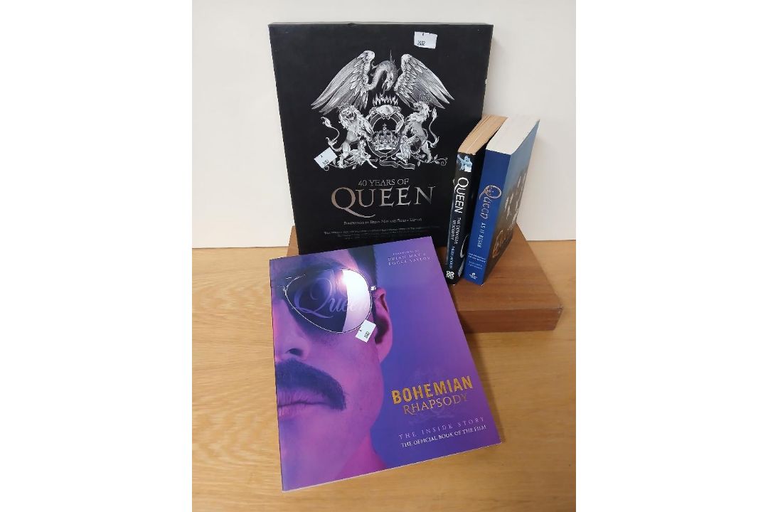 A selection of Queen books and some drumsticks - a nice set of collectables - Image 1 of 10