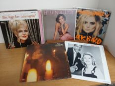 A lot of thirty mixed female vocal albums as in photos , pop , jazz , folk and more on offer here