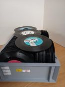 A selection of approximately 200 mixed seven inch singles - varied genres and a bit of lucky dip ,
