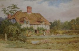 Thomas Nicholson Tyndale (British 1860-1930) Watercolour, a countryside cottage with figure,