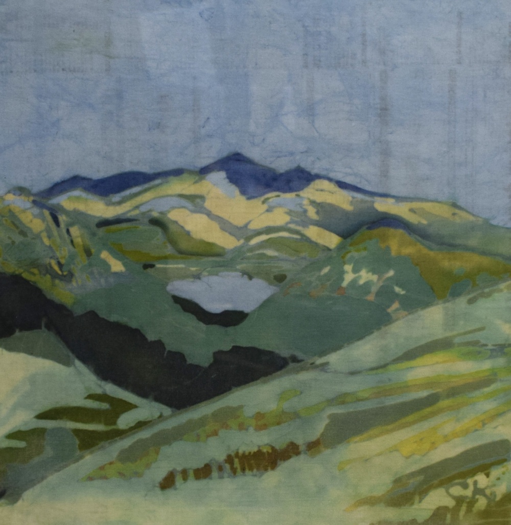 A Contemporary Batik composition, depicting a mountain in blue and green tones, initialled (CK)