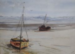 Reed (20th Century) Watercolour, a coastal landscape depicting beached fishing boats at low tide,