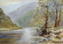 J Norman (20th Century) Watercolour, a mountainous river scene, signed in pencil lower left,
