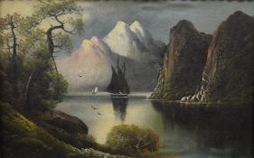 A 20th Century oil on canvas landscape, a mountainous lake scene with sailing boat, unsigned or