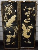 A pair of 20th Century Chinese lacquered panels with mother of pearl and guilding, depicting