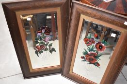 A pair of late 19th or early 20th Century oak framed mirrors having etched vase with hand painted