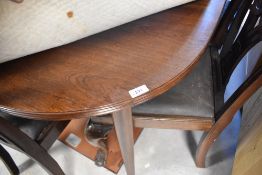 A modern mahogany oval extending dining table, by Bath cabinet makers, approx 105 x 162cm, plus