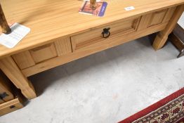 Two modern natural pieces, being coffee table and TV cabinet