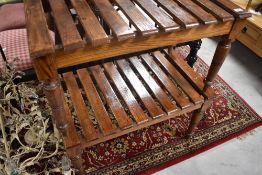 A pair of vintage slatted luggage racks having turned legs, approx. 76 x 45 x 43cm
