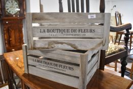 A pair of modern decorative reproduction flower crates, approx. 40 x 30 x 18cm