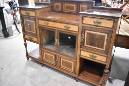 A late Victorian mahogany and birds eye maple, side cabinet , having glazed centre section and