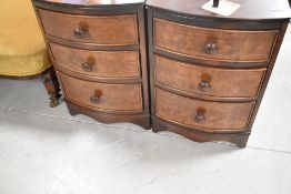 A pair of reproduction mahogany three drawer bow fronted bedside chests and a plant stand, chests