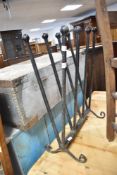 A cast iron riding boot or similar rack (four pairs) , height approx. 60cm