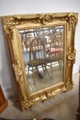 A modern gilt frame wall mirror, approx. 124 x 91cm