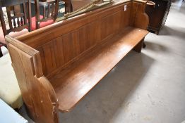 A traditional pitch pine church pew, width approx. 193cm