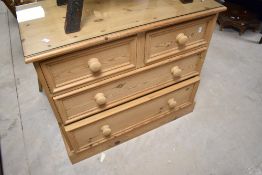 A modern natural pine chest of two over two drawers, dimensions approx. width 86 depth 43 height