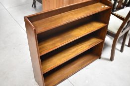 A vintage mahogany low bookshelf, dimensions approx. Width 92 height 83 depth 23cm (max)