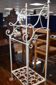 A modern wrought metal and powder coated towel rail in the Victorian style, dimensions approx.