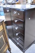 A modern mahogany wardobe/tallboy , probably Stag comprising wardobe section and 6 drawers,