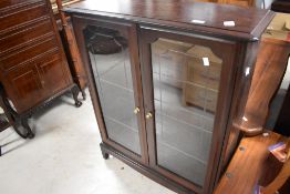 A vintage Stag low bookcase, dimensions approx. Width 80 height 101 depth 28cm