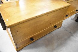 A 19th Century scumbled pine bedding chest having drawer to base with ebonised handles, dimensions