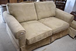 A modern two seater settee and footstool, settee with approx. 180cm