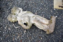 A concrete garden ornament modelled as a cherub with flowers, height approx 79cm