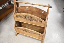 A modern two tier magazine rack in the Indian style , dimensions approx. Height 63, width 53cm