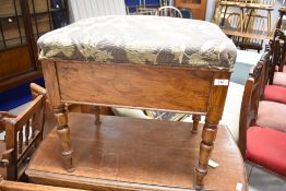 A Victorian stained frame piano stool of large proportions with deep storage under seat, approx.